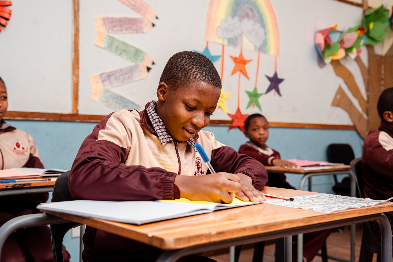 A pupil concentrating on his written work