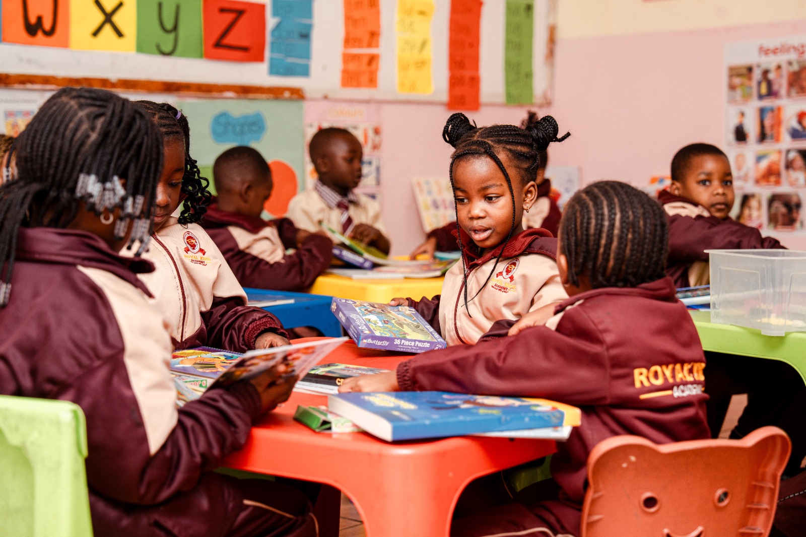 Pre-Primary pupils enjoying puzzles and books together